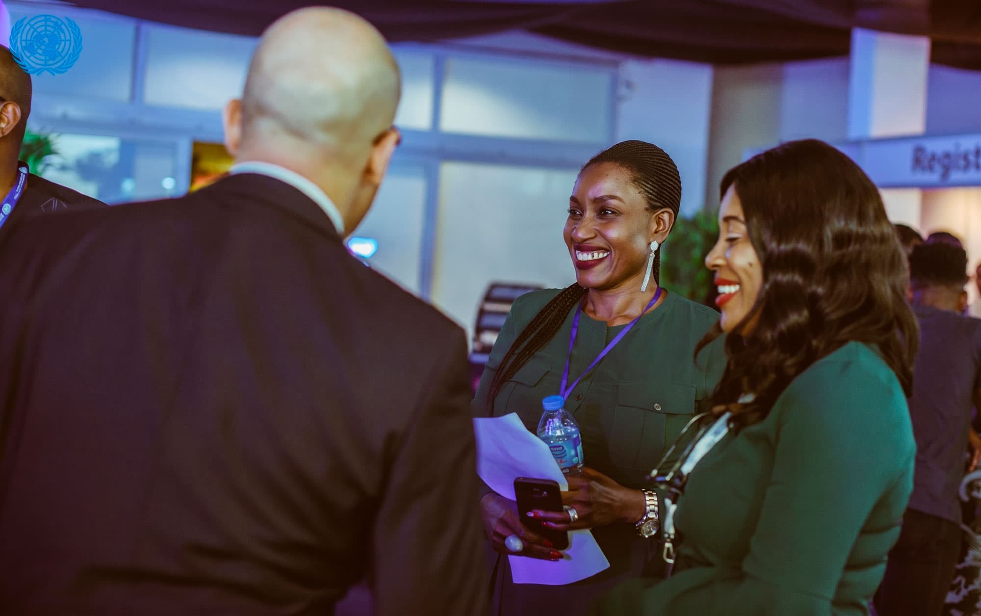 Attendees in conversation at a United Nations event