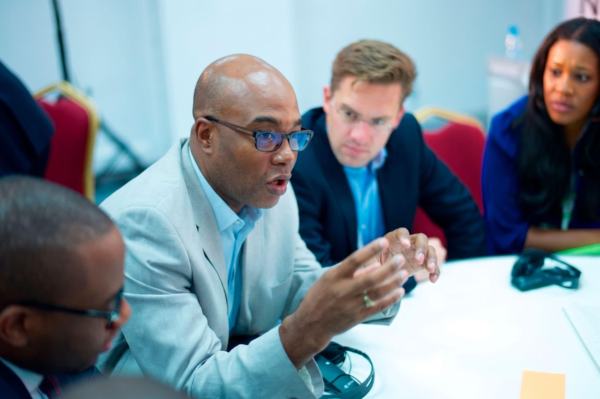 Business team arranging sticky notes during a planning session