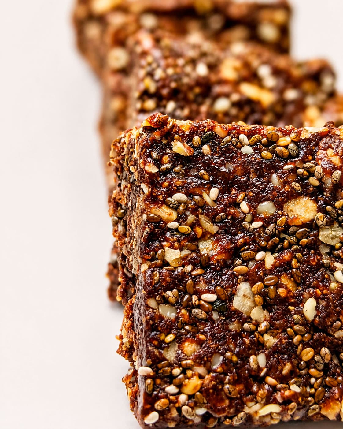 Date and seed snack bar with nuts and puffed grains