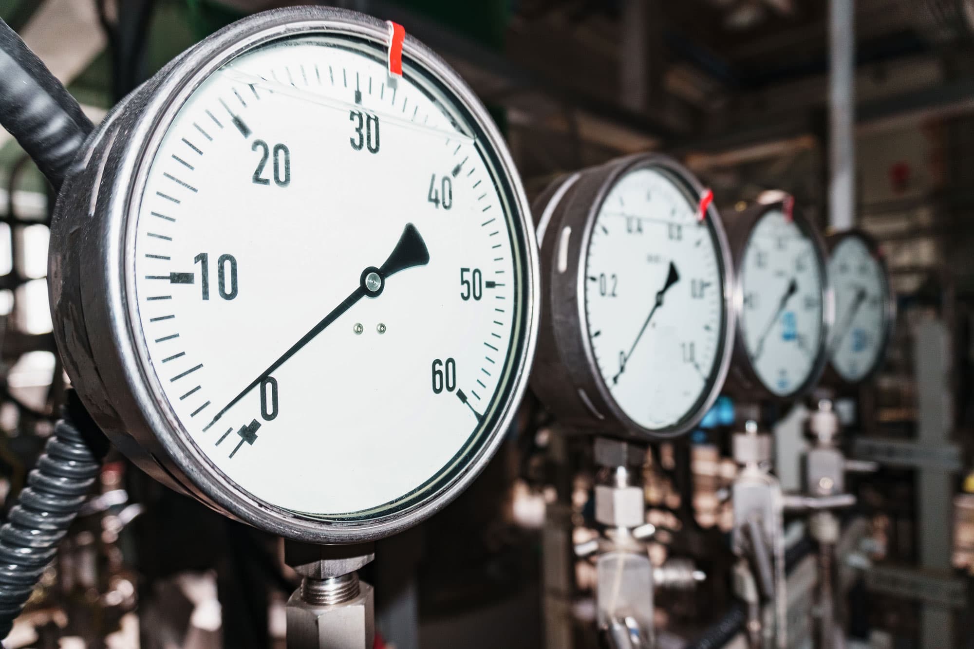 Close-up of industrial pressure gauges