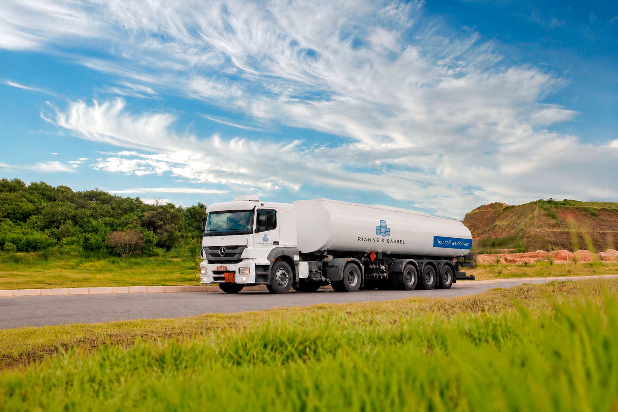 Fuel tanker travelling along a rural road